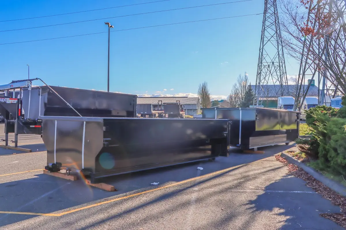 Roll-off dumpster ready for waste disposal at job site for Commercial Dumpster Rental in Long View